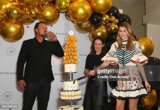 Edwina McCann and David Collins look on as Victoria Lee cuts the cake during David Jones 180th Birthday Celebrations at David Jones Elizabeth Street...