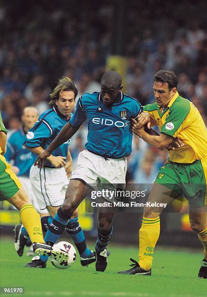 Paulo Wanchope of Manchester City takes on Malky Mackay of Norwich City during the Nationwide League Division One match between Manchester City and...