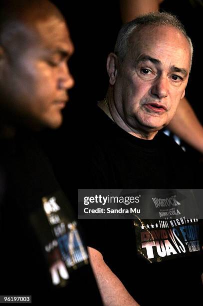 Boxer David Tua listens as his trainer Roger Bloodworth talks during a press conference ahead of the fight night bout between David Tua and Friday...