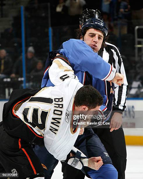 Mike Brown of the Anaheim Ducks fights with Chris Thorburn of the Atlanta Thrashers at Philips Arena on January 26, 2010 in Atlanta, Georgia.