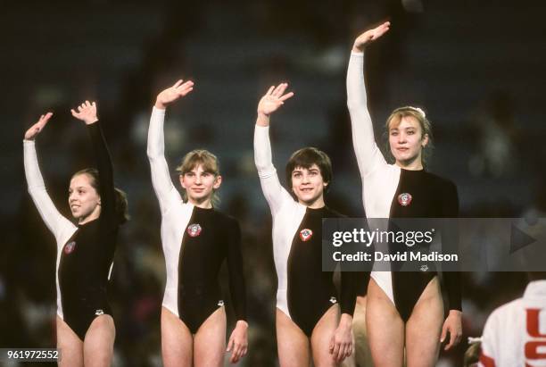 Tatiana Lysenko, Natalia Kalanina, Oksana Chusovitina, and Svetlana Boginskaya of the USSR Women's Gymnastics Team wave to the crowd during the...