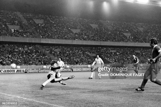 Liverpool's English defender Alan Kennedy scores a goal past Real Madrid's Spanish goalkeeper Agustin during the European Cup final football match...