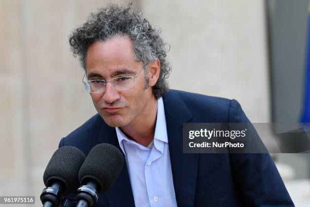 Of Palantir Alex Karp speaks to the press as he leaves the Elysee Palace in Paris, on May 23, 2018 after the &quot;Tech for Good&quot; summit, in...