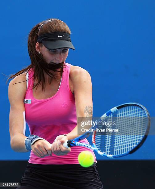 Karolina Pliskova of the Czech Republic plays a backhand in her third round juniors match against Risa Ozaki of Japan during day ten of the 2010...