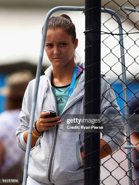 Laura Robson of Great Britain walks past outside courts before her third round juniors match during day ten of the 2010 Australian Open at Melbourne...
