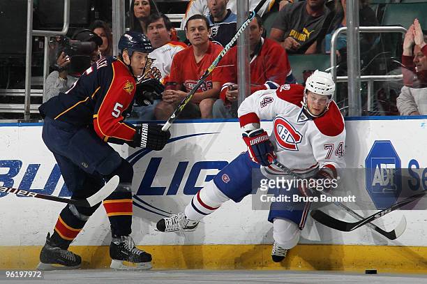 Bryan Allen of the Florida Panthers steps into Sergei Kostitsyn of the Montreal Canadiens at the BankAtlantic Center on January 26, 2010 in Sunrise,...