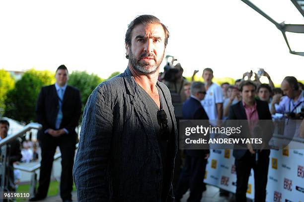 In a file picture taken on June 1 2009 former French international footballer and film actor Eric Cantona arrives at the Vue cinema at the Lowry...