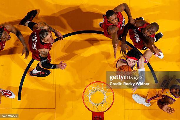 Vladimir Radmanovic of the Golden State Warriors puts up a shot against Joel Anthony of the Miami Heat during the game on January 13, 2010 at Oracle...