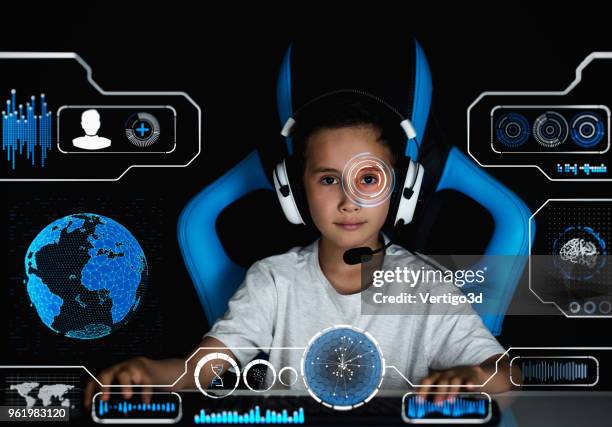 gamer boy with virtual hud - game ui imagens e fotografias de stock