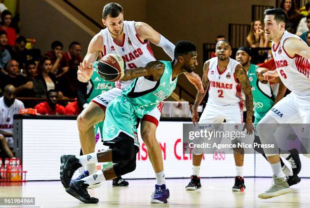 Taqwa Pinero of pau Orthez and Elmedin Kikanovic of Monaco during the Jeep Elite quarter-final play-off match between Monaco and Elan Bearnais Pau on...