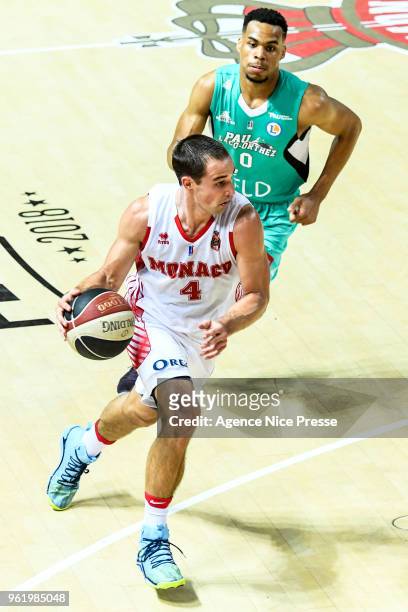 Aaron Craft of Monaco and Elie Okobo of Pau Orthez during the Jeep Elite quarter-final play-off match between Monaco and Elan Bearnais Pau on May 23,...