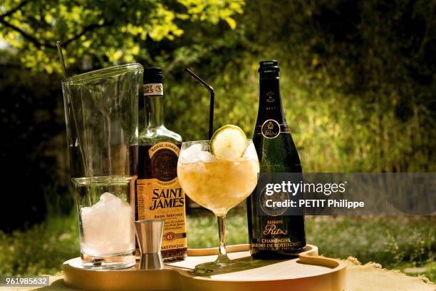 Wines and Champagnes for summer. Ritz Mojito Cocktail in homage to Ernest Hemingway with a Champagne Rothschild Barons Raw Ritz Reserve, white rum...