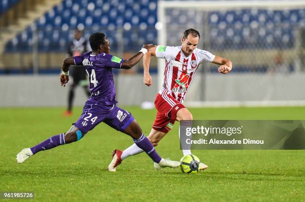Firmin Mubele of Toulouse and Kevin Lejeune of Ajaccio during the Ligue 1 play-off match between AC Ajaccio and Toulouse at Stade de la Mosson on May...
