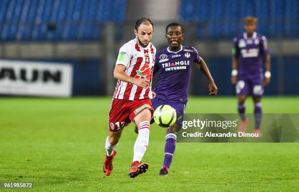 Jerome Hergault of Ajaccio and Max Greadel of Toulouse during the Ligue 1 play-off match between AC Ajaccio and Toulouse at Stade de la Mosson on May...
