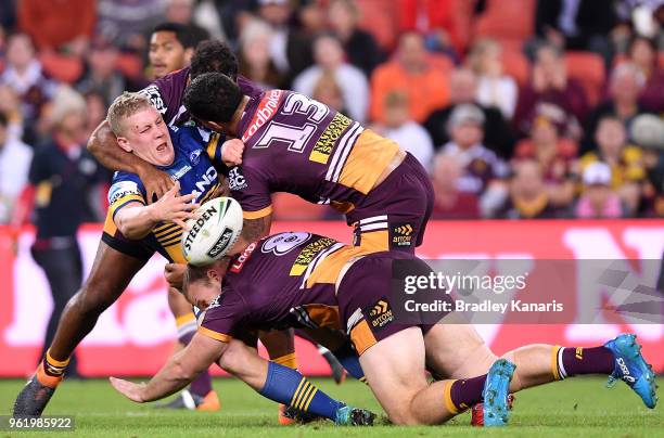 Daniel Alvaro of the Eels offloads during the round 12 NRL match between the Brisbane Broncos and the Parramatta Eels at Suncorp Stadium on May 24,...