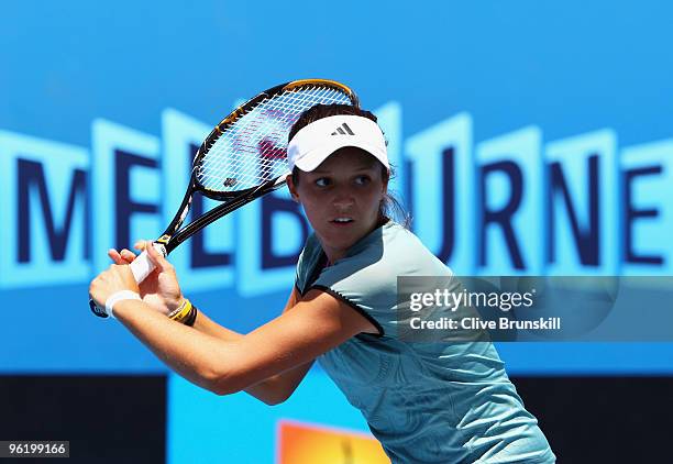 Laura Robson of Great Britain plays a backhand in her third round juniors match against Cristina Dinu of Romania during day ten of the 2010...