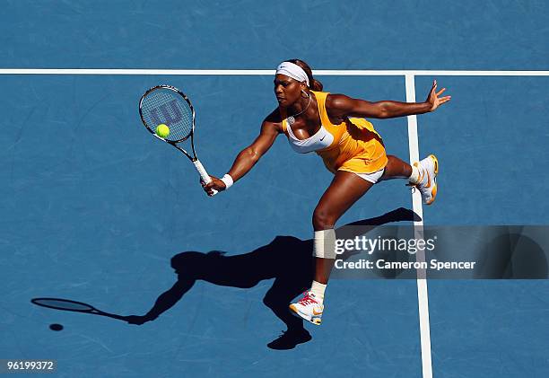 Serena Williams of the United States of America plays a forehand in her quarterfinal match against Victoria Azarenka of Belarus during day ten of the...