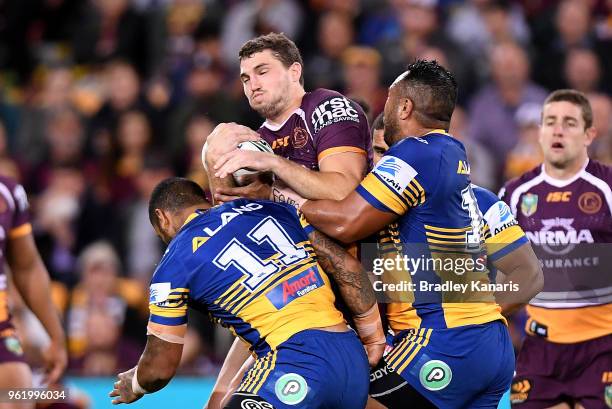 Corey Oates of the Broncos takes on the defence during the round 12 NRL match between the Brisbane Broncos and the Parramatta Eels at Suncorp Stadium...