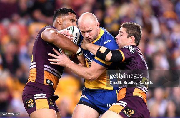 David Gower of the Eels takes on the defence during the round 12 NRL match between the Brisbane Broncos and the Parramatta Eels at Suncorp Stadium on...