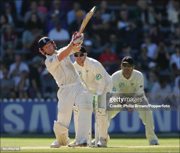 Paul Collingwood of England hits out during his innings of 59 runs watched by New Zealand's Brendon McCullum and Stephen Fleming during the 2nd Test...