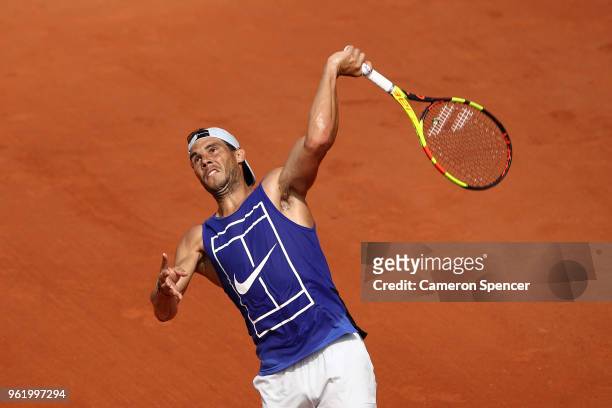 Rafael Nadal of Spain serves during a practice session ahead of the French Open at Roland Garros on May 24, 2018 in Paris, France.