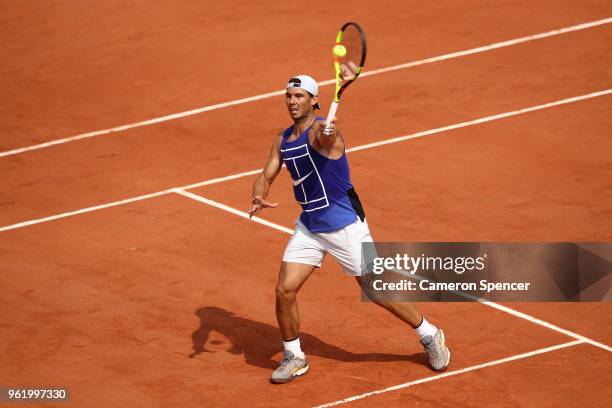 Rafael Nadal of Spain plays a forehand during a practice session ahead of the French Open at Roland Garros on May 24, 2018 in Paris, France.