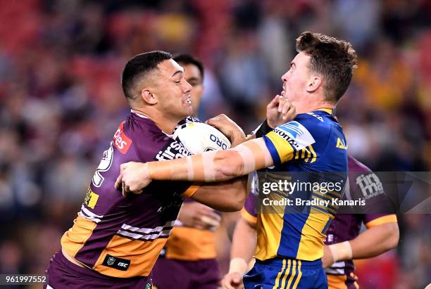 Jaydn Su'a of the Broncos takes on the defence during the round 12 NRL match between the Brisbane Broncos and the Parramatta Eels at Suncorp Stadium...