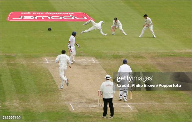 Brendon McCullum of New Zealand takes the catch to dismiss Monty Panesar of England off the bowling of Kyle Mills during the 2nd Test match between...