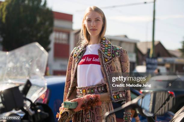 Model Chiara Mazzoleni attends the Gucci show and wears a embellished animal skin jacket during Milan Fashion Week Spring/Summer 2018 on September...