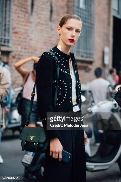 Model Maria Zakrzewska wears a Sandro Paris jacket, green Prada bag during Milan Fashion Week Spring/Summer 2018 on September 23, 2017 in Milan,...
