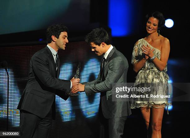Actors B.J. Novak and Taylor Lautner onstage at the People's Choice Awards 2010 held at Nokia Theatre L.A. Live on January 6, 2010 in Los Angeles,...