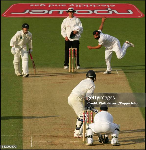 Monty Panesar of England bowls to New Zealand batsman Jamie How near the end of day four of the 1st Test match between England and New Zealand at...