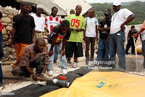 In this handout image provided by the United Nations Stabilization Mission in Haiti , Agency for Technical Cooperation and Development , a...