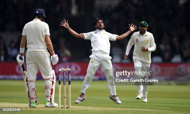 Hasan Ali of Pakistan celebrates dismissing England captain Joe Root during the NatWest 1st Test match between England and Pakistan at Lord's Cricket...