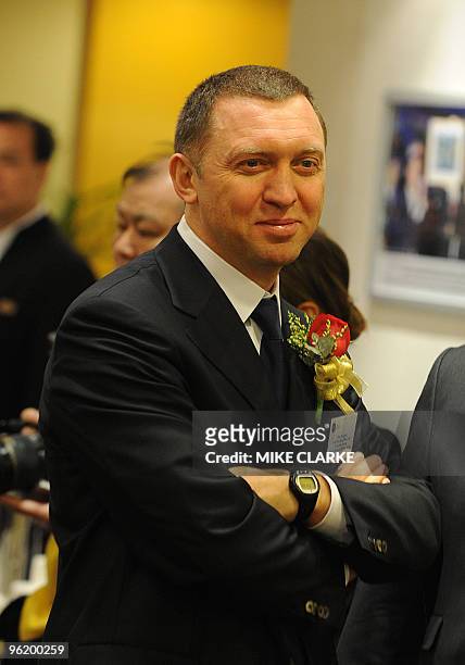 Oleg Deripaska, Chief Executive Officer of Russian metals giant UC Rusal, smiles during the stock exchange listing of his company in Hong Kong on...