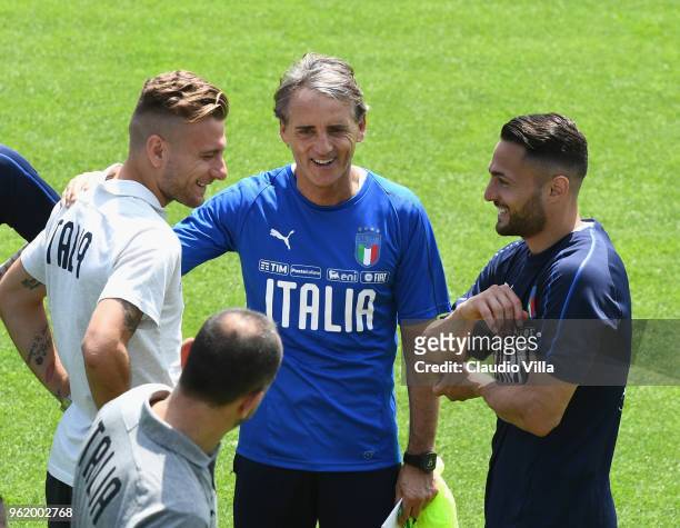 Ciro Immobile, head coach Italy Roberto Mancini and Danilo D'Ambrosio chat during a Italy training session at Centro Tecnico Federale di Coverciano...