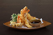 Tempura shrimps (deep fried shrimps) with soy sauce.