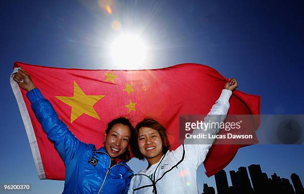 Jie Zheng and Na Li of China pose with the Chinese flag at Grand Slam Oval during day ten of the 2010 Australian Open at Melbourne Park on January...