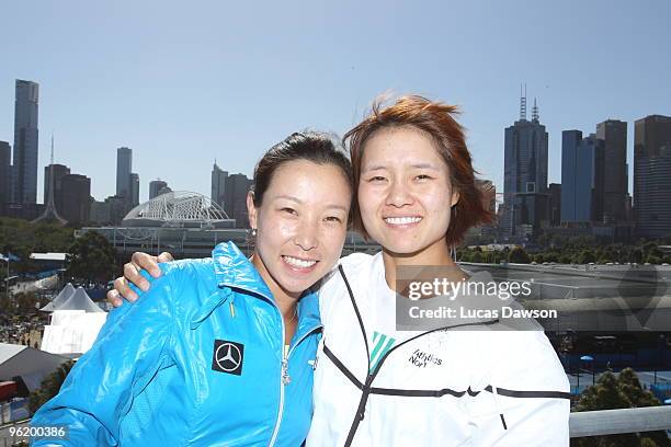 Jie Zheng and Na Li of China pose at Grand Slam Oval during day ten of the 2010 Australian Open at Melbourne Park on January 27, 2010 in Melbourne,...