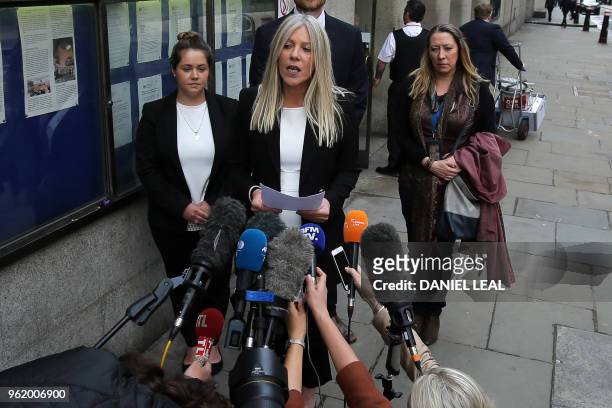 Detective Inspector Domenica Catino gives a statement to members of the media outside London's Central Crimnal Court in central London on May 24...
