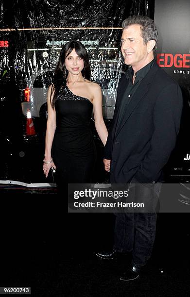 Actor Mel Gibson and girlfriend Oksana Grigorieva, musician arrives at the Premiere Of Warner Bros. "The Edge Of Darkness" held at the Grauman's...