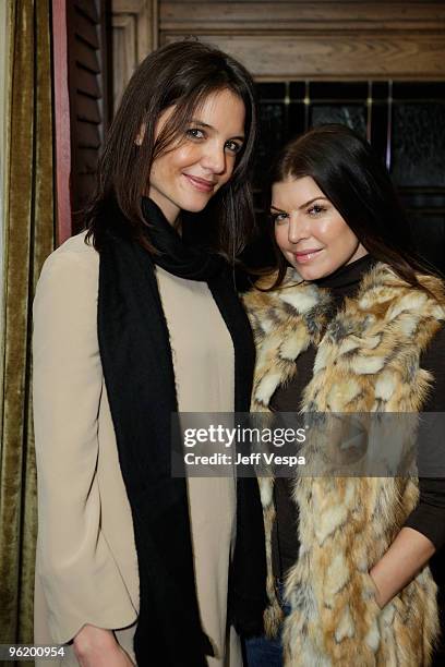 Actress Katie Holmes and singer Fergie attend "The Romantics" dinner hosted by Magaschoni at Stein Erickson Lodge on January 26, 2010 in Park City,...