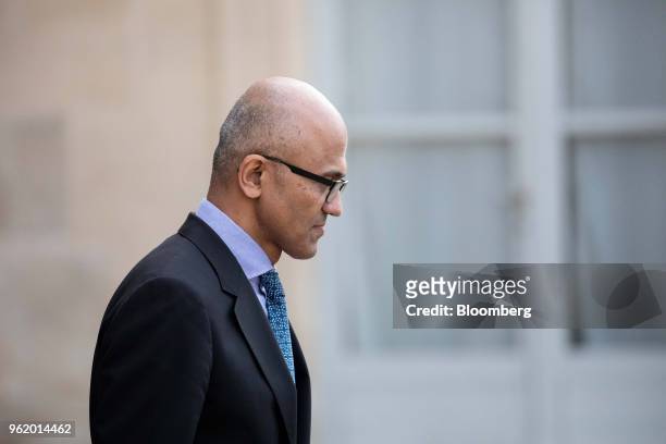 Satya Nadella, chief executive officer of Microsoft Corp., departs the 'Tech For Good' meeting at Elysee Palace in Paris, France, on Wednesday, May...