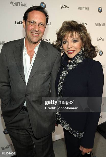 Actress Joan Collins and husband Percy Gibson arrive at the BMW Art Car U.S. Tour hosted by Vanity Fair held at LACMA on February 18, 2009 in Los...