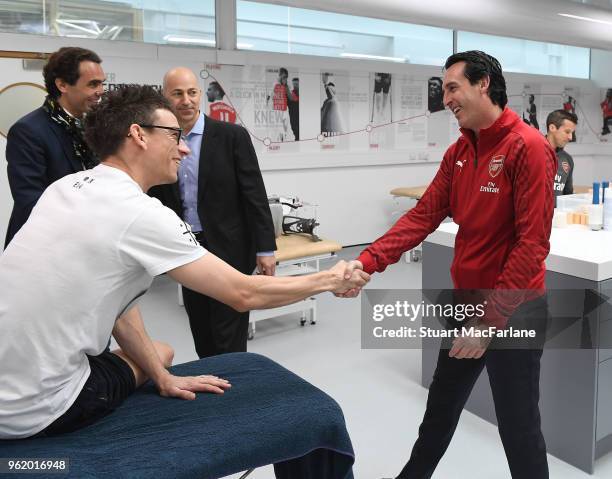 Head Coach Unai Emery meets injured Arsenal defender Laurent Koscielny at London Colney on May 24, 2018 in St Albans, England.