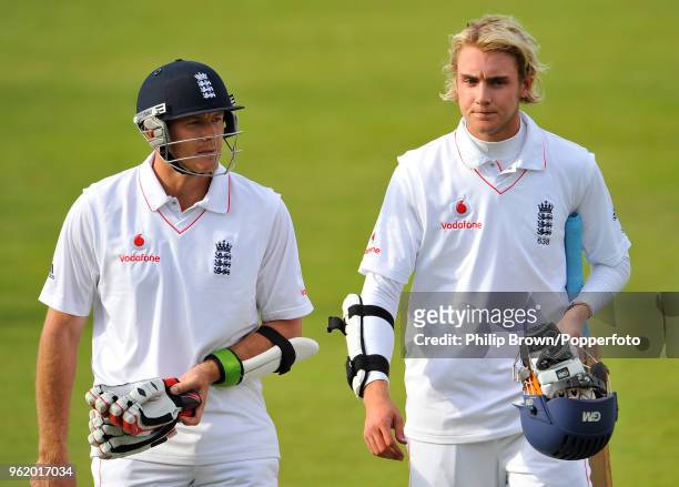 England's Darren Pattinson and Stuart Broad leave the field at the end of England's 2nd innings of the 2nd Test match between England and South...