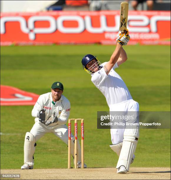 Andrew Flintoff of England hits out watched by Mark Boucher of South Africa during the 2nd Test match between England and South Africa at Headingley,...