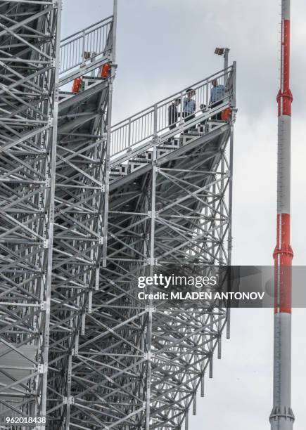 Russian police officers gather on the stands of Ekaterinburg Arena in Yekaterinburg on May 24, 2018. - The 35,000-seater stadium will host four group...