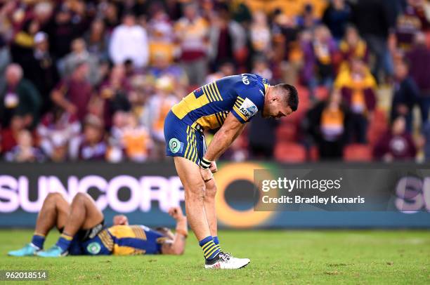 Corey Norman of the Eels and team mates look dejected after losing the round 12 NRL match between the Brisbane Broncos and the Parramatta Eels at...
