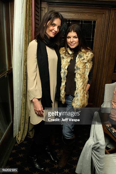 Actress Katie Holmes and singer Fergie attend "The Romantics" dinner hosted by Magaschoni at Stein Erickson Lodge on January 26, 2010 in Park City,...